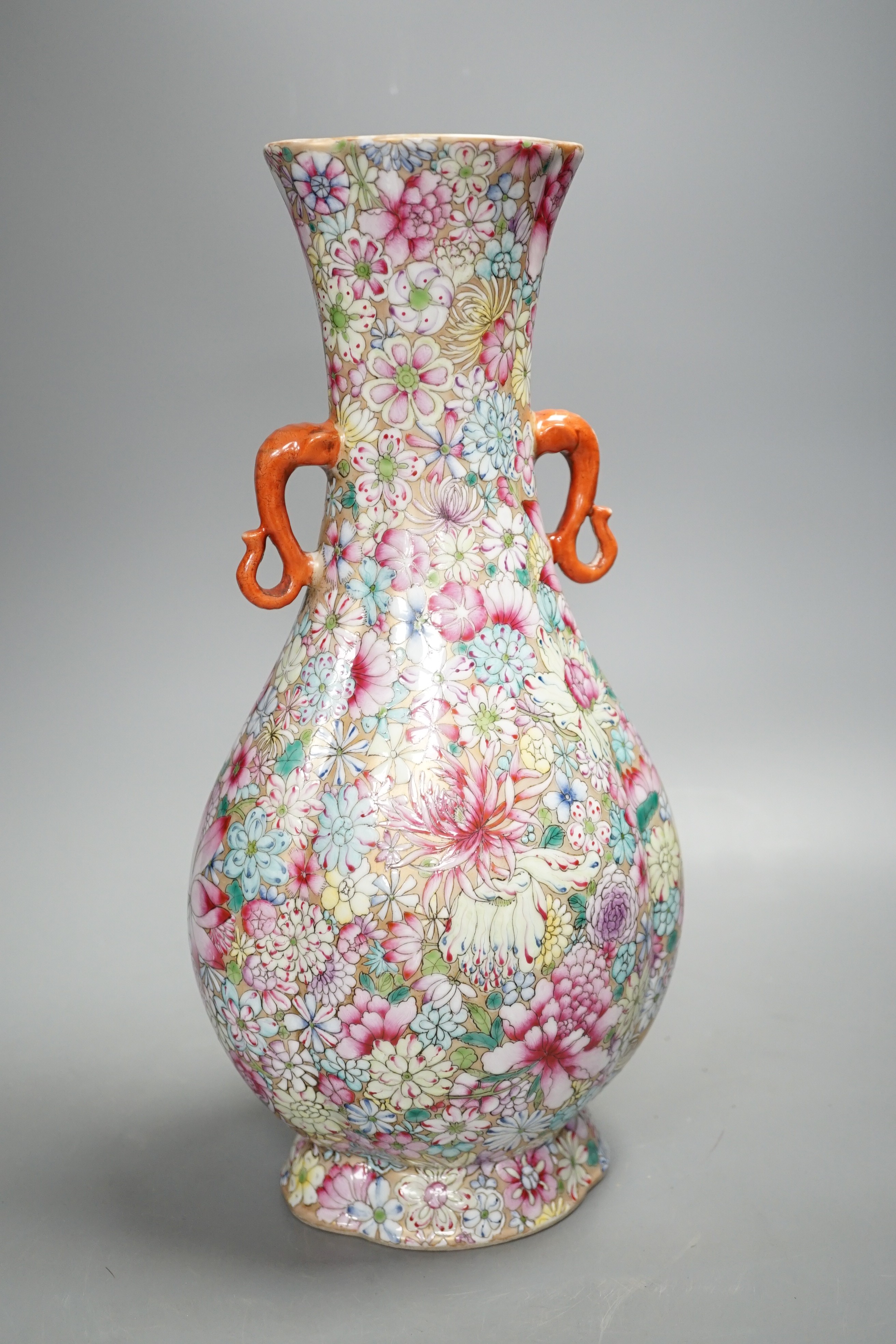 A Chinese famille rose millefleur 2 handled vase, 36cms high.